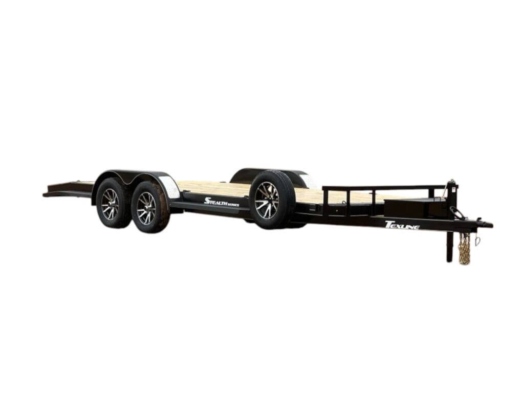 Texline Trailers | Trailer Manufacturer Discover high-quality trailers expertly crafted by Texline, a leading Trailer Manufacturer. This sleek car hauler boasts a robust black frame, dual axles, and a durable wooden platform, all equipped with a dependable hitch for secure towing. Explore our Trailers for Sale today!. | Trailers for Sale